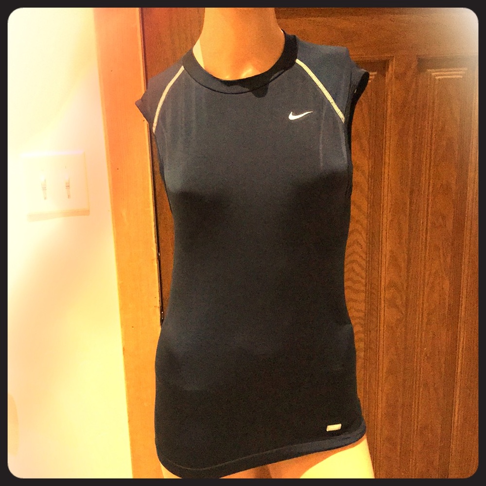 3 Sleeveless performance shirts. One Nike, one Under Armor and one Body Glove.